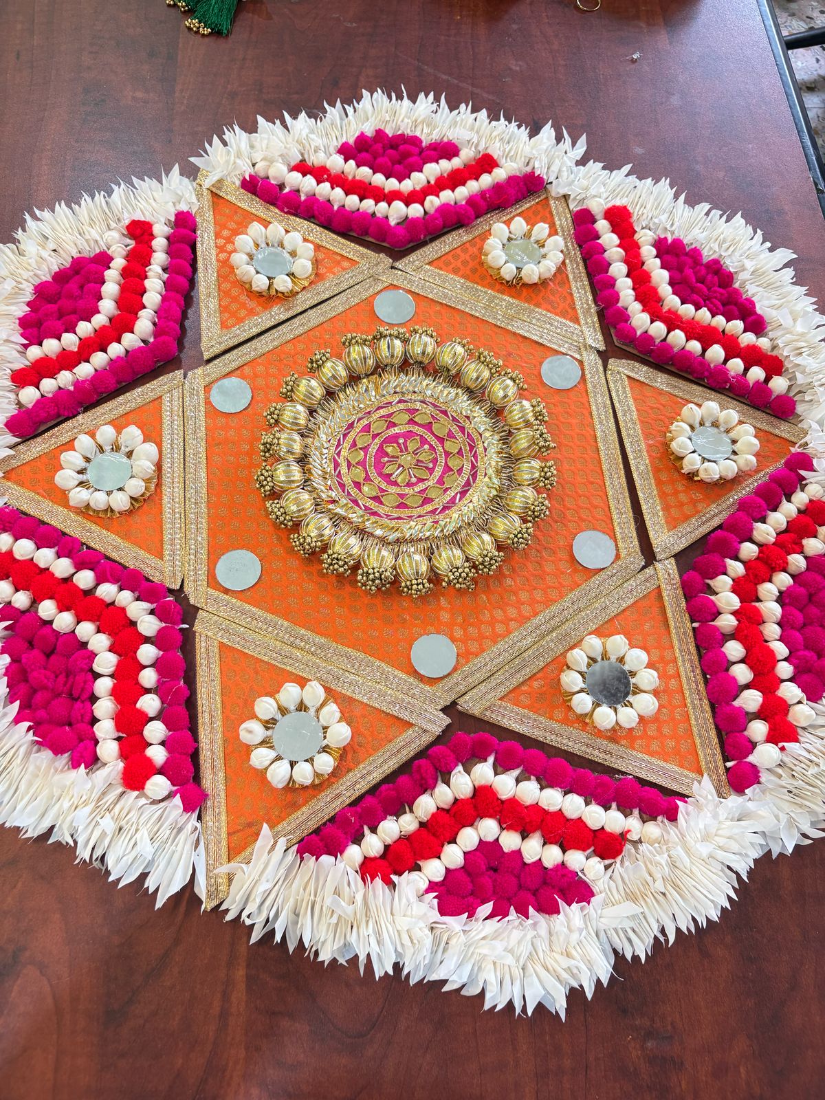 Orange Pink Chumki Floor Rangoli
