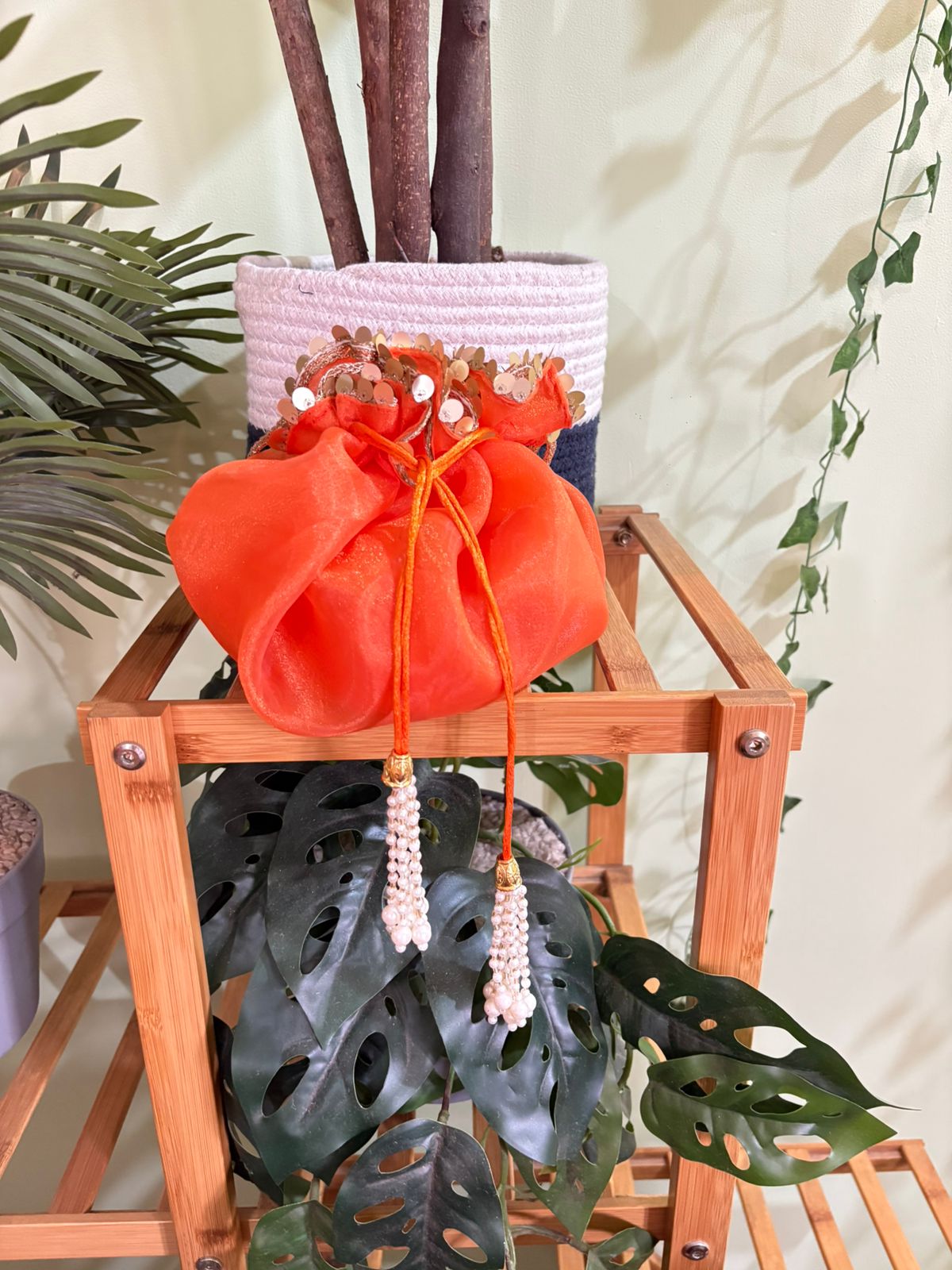 Scrunchy Organza potli with golden handle and golden sequins lace - Image 3