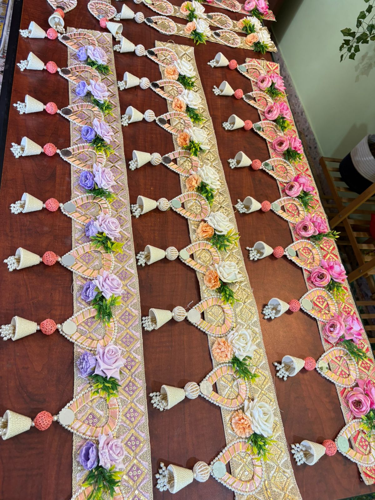 Pastel shades of bandanwars with floral work (set of 2 bandanwar and hanging) )